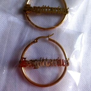 Sagittarius sign brand new gold colored earrings